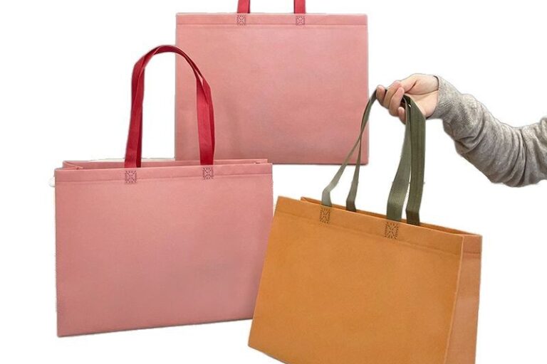 Fashion Non Woven Carry Bags Custom Printing for Apparel Packaging & Promotion (3) Custom Printed Fashion Non-Woven Carry Bags for Clothing Stores